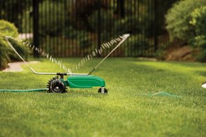 Using a tractor sprinkler to water your lawn is fun and innovative.